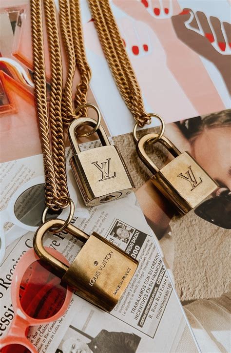 lv vintage lock necklace|louis vuitton locket necklace.